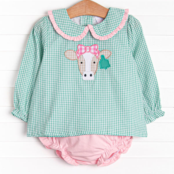 This set features mint green gingham, a peter pan collar, and a cow applique. Coordinating pink diaper cover to match.