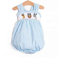 This bubble features a blue check print, a jungle animal smocking with mouse ears, and snaps on the stride.