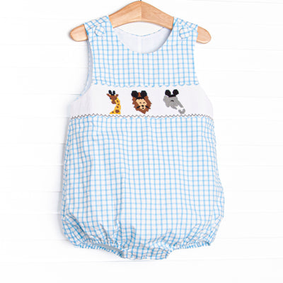 This bubble features a blue check print, a jungle animal smocking with mouse ears, and snaps on the stride.