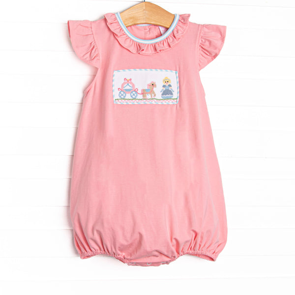  This bubble features flutter sleeves, a carriage smocking, and snaps on the stride to make changing a breeze. 