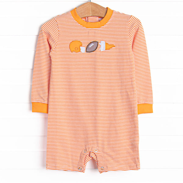 This romper features a orange striped print, snaps on the stride, and a football applique.