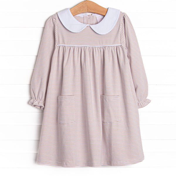  A tan stripes, pockets and piping at the chest 