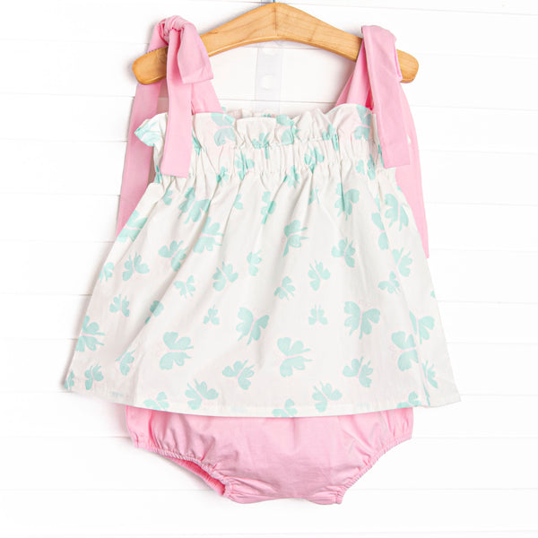 This set features an butterfly print, elastic trim, and pink shoulder ties. Coordinating pink diaper cover to match.