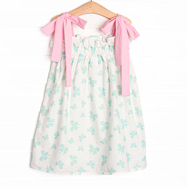  This set features an butterfly print, elastic trim, and pink shoulder ties. 