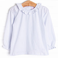  This top features the softest knit material, long sleeves, and a ruffle collar. 