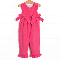  Featured in a hot pink color, with bow details on the sides and snaps along the stride. 