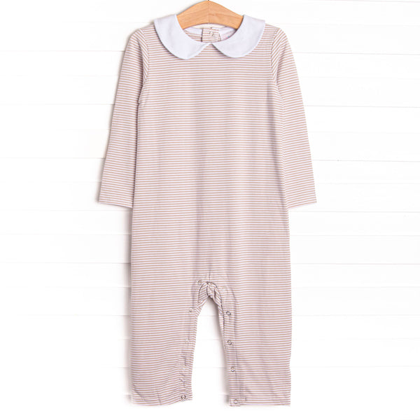  The romper features tan stripes, snaps in the stride to make changing a breeze, and soft knit material. 