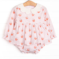 This set features pink gingham and strawberry printed fabric, a white scalloped collar, and long sleeves. Coordinating diaper cover to match.