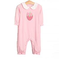 his romper features pink knit fabric, a white Peter Pan collar, strawberry and bow appliques, and snaps along the stride to make changing a breeze