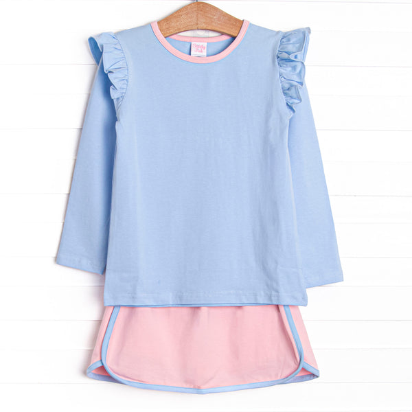  This set features a blue top with flutter shoulders and blue trim. Coordinating pink skirt with blue trim. 