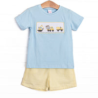This set features a blue short sleeve top with a construction smocking and yellow seersucker shorts to match.