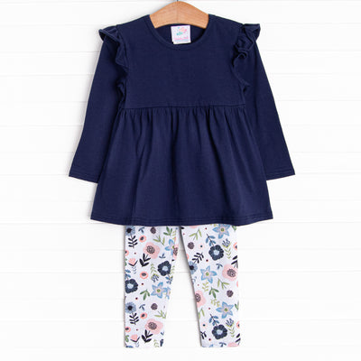 The set features a long sleeve shirt, coordinating leggings, and soft knit material.
