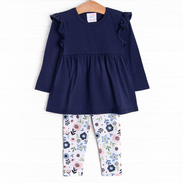 The set features a long sleeve shirt, coordinating leggings, and soft knit material.