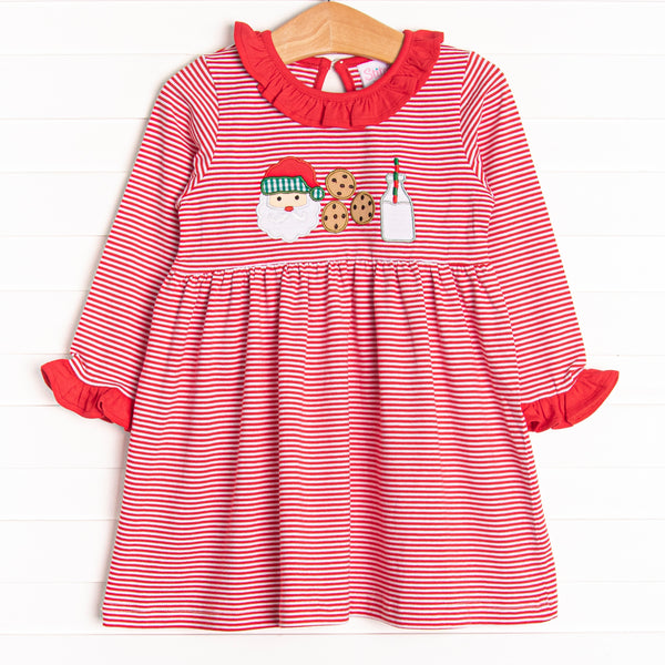  Our Santa's Treat Trio Dress includes red stripes, coordinating ruffle around the neck, and the cutest Christmas applique. 