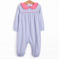 This romper features a periwinkle stripes, a peter pan collar with ruffle trim, and snaps on the stride to make changing a breeze.