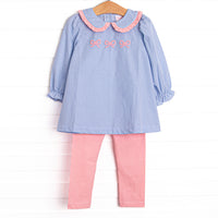 This set features a blue gingham print, a peter pan collar with pink ruffle trim, and a trio of bow embroideries. Coordinating pink leggings to match.