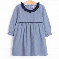 The dress features ruffle collar, navy blue stripes, and soft knit material.