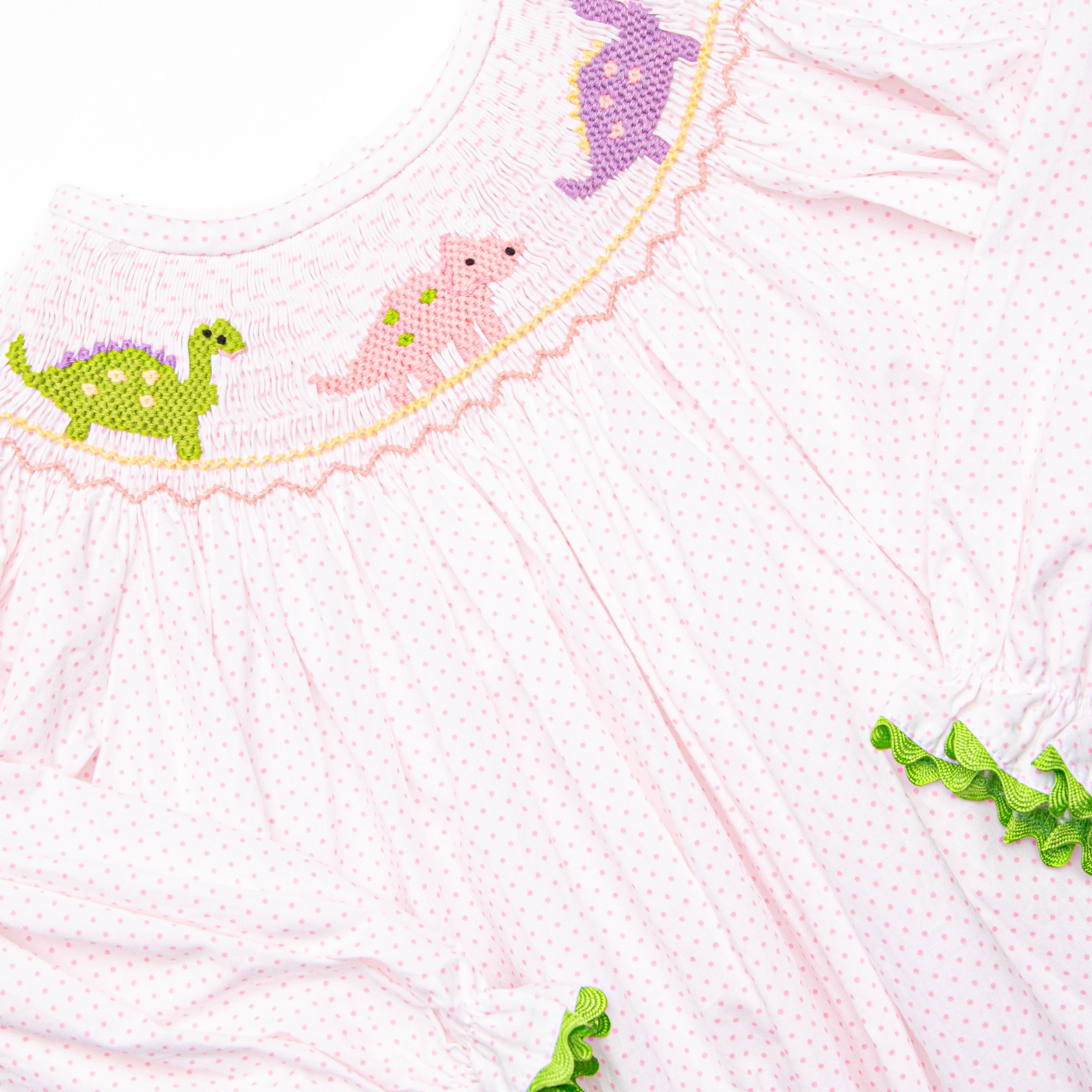 Girl's Dino Parade Smocked Dress in Pink size 8 | Stitchy Fish Girl's Dino Parade Smocked Dress in Pink size 8 | Stitchy Fish