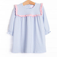 This cozy knit favorite is a staple for every little girl's closet. Featured here in blue stripes and with pink ruffle trim!