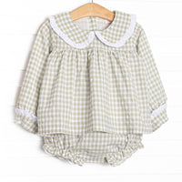 This set is featured in a green gingham print, a peter pan collar with a ruffle detail. Matching diaper cover to complete the set.
