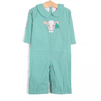  This romper features mint green gingham, a peter pan collar, and a cow applique. 
