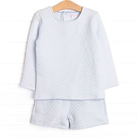 This set features a long sleeve top and matching shorts in cozy quilted blue material and snap closure on the back of neck.