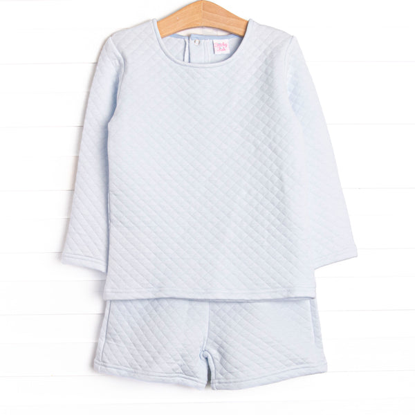 This set features a long sleeve top and matching shorts in cozy quilted blue material and snap closure on the back of neck.