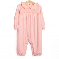 This romper features a peach stripes, a peter pan collar with ruffle trim, and snaps on the stride to make changing a breeze.