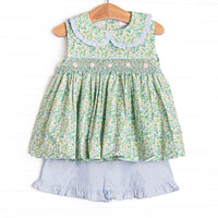This set features a green floral print, peter pan collar, and a dainty floral smocking. Coordinating blue ruffle shorts to match.