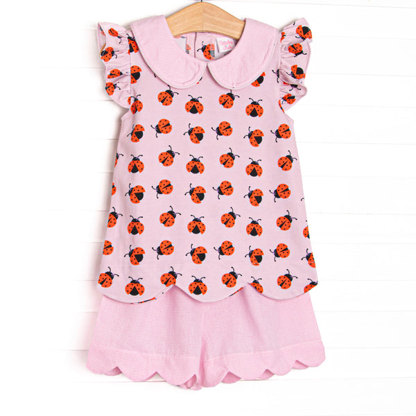 This set features a lady bug print, flutter sleeves, and pink gingham&nbsp; peter pan collar. Coordinating pink gingham scalloped shorts to match.