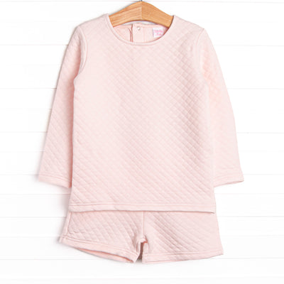 This set features a long sleeve top and matching shorts in cozy quilted pink material and snap closure on the back of neck.