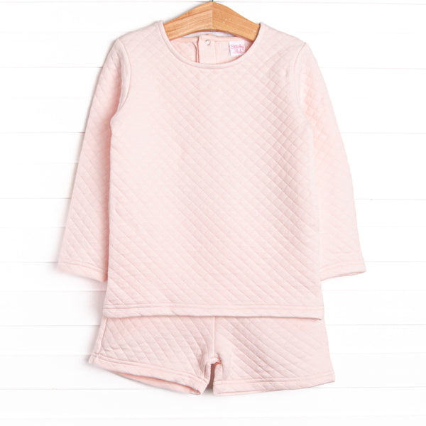 This set features a long sleeve top and matching shorts in cozy quilted pink material and snap closure on the back of neck.