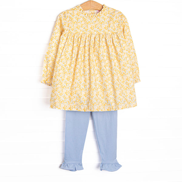  This set features a yellow floral fabric, a yellow ruffle collar, and long sleeves. Coordinating blue leggings to match. 