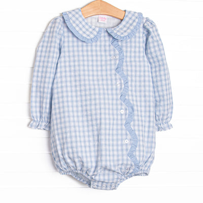 This bubble features blue plaid fabric, a ruffle Peter Pan collar, front buttons, and scalloped edges.
