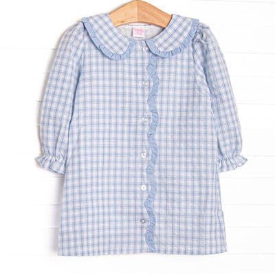 This dress features blue plaid fabric, a ruffle Peter Pan collar, front buttons, and scalloped edges.