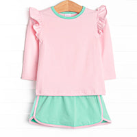 This set features a pink top with flutter shoulders and green trim. Coordinating mint green skirt with pink trim.