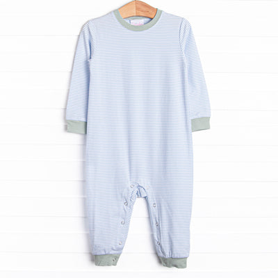 The Romper features long sleeves, snaps in the stride to make changing a breeze, and soft knit material.