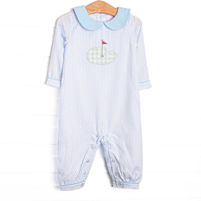  This romper features blue stripes, a golfing green applique, and a blue Peter Pan collar. 