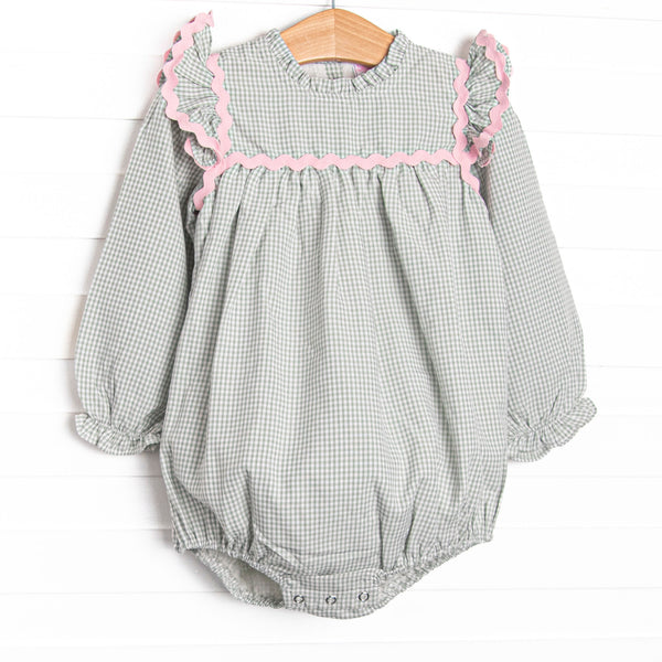  This bubble features a sage gingham print, pink ric rac trim, and flutter sleeves. 
