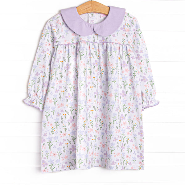  This dress features a purple floral print, a purple peter pan collar and the softest knit material. 