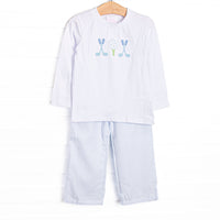  This set features a white top, long sleeves, and golf applique. Coordinating blue pants to match. 