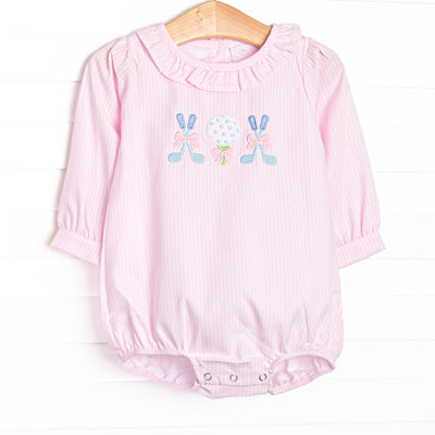 This bubble features pink striped fabric, a ruffle collar, and golf applique.