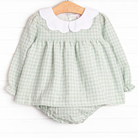  This set features a green plaid print, a scallop collar, and matching diaper cover. 