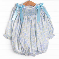  A long sleeve bubble with a blue smocking and blue bow details on the shoulders.&nbsp; 