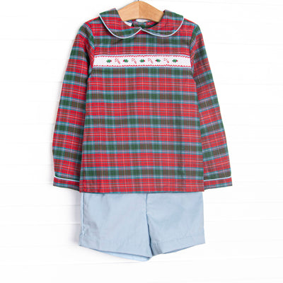 This set features a red and green plaid top, a peter pan collar, and candy cane smocking. Coordinating light blue corduroy shorts to match.