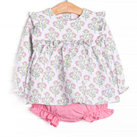 This set features a pink floral print, flutter details and a pink diaper cover to match.