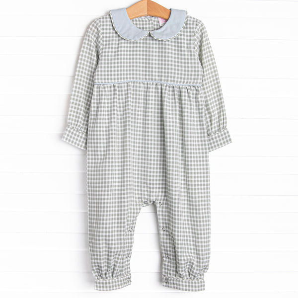  This romper is featured in green gingham print, with a blue peter pan collar and snaps on the stride to make changing a breeze. 