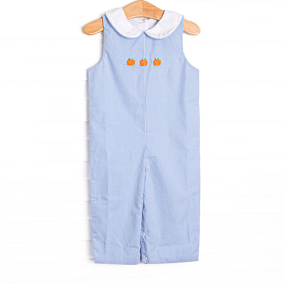  This Jon Jon features a blue gingham print, a white Peter Pan collar, and pumpkin embroideries. 