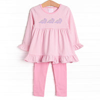  This set features a pink striped top with a dinosaur applique and pink leggings to match. 