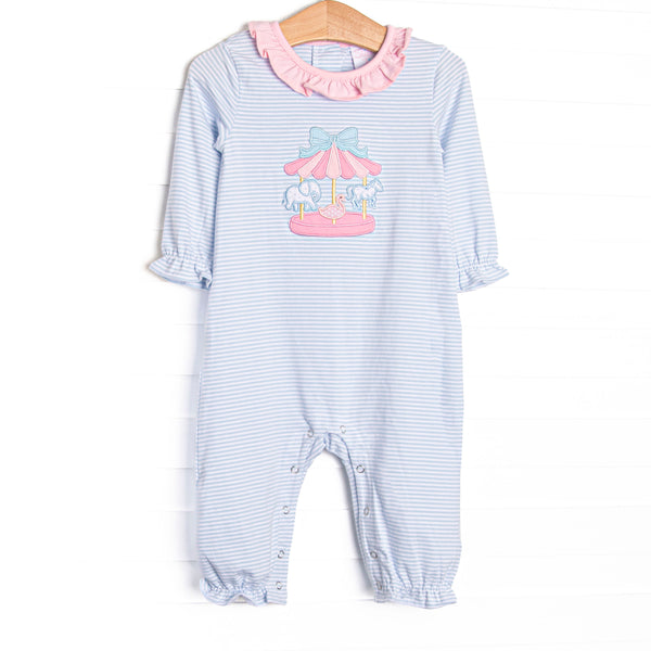 This romper features blue striped fabric, a pink ruffle collar, a carousel applique, and snaps along the stride to make changing a breeze.